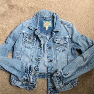Cropped and distressed jean jacket